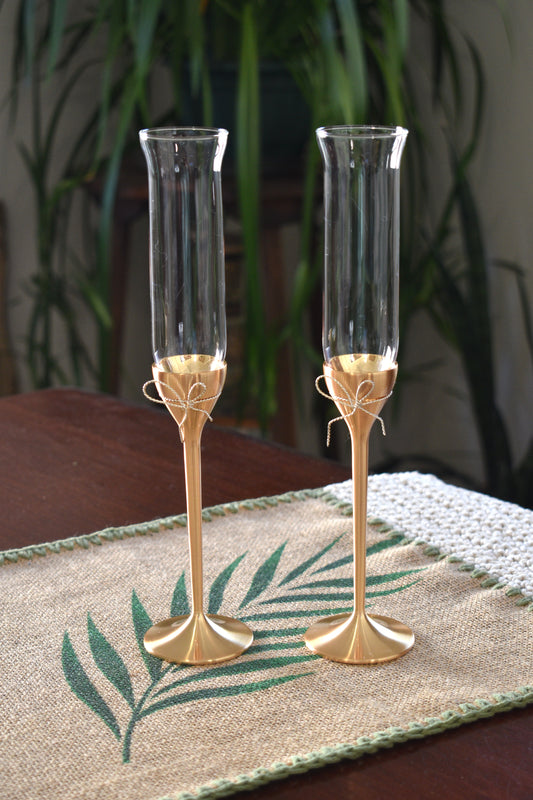 Wedgwood Vera Wang "Love Knots" gold toasting flute pair.
