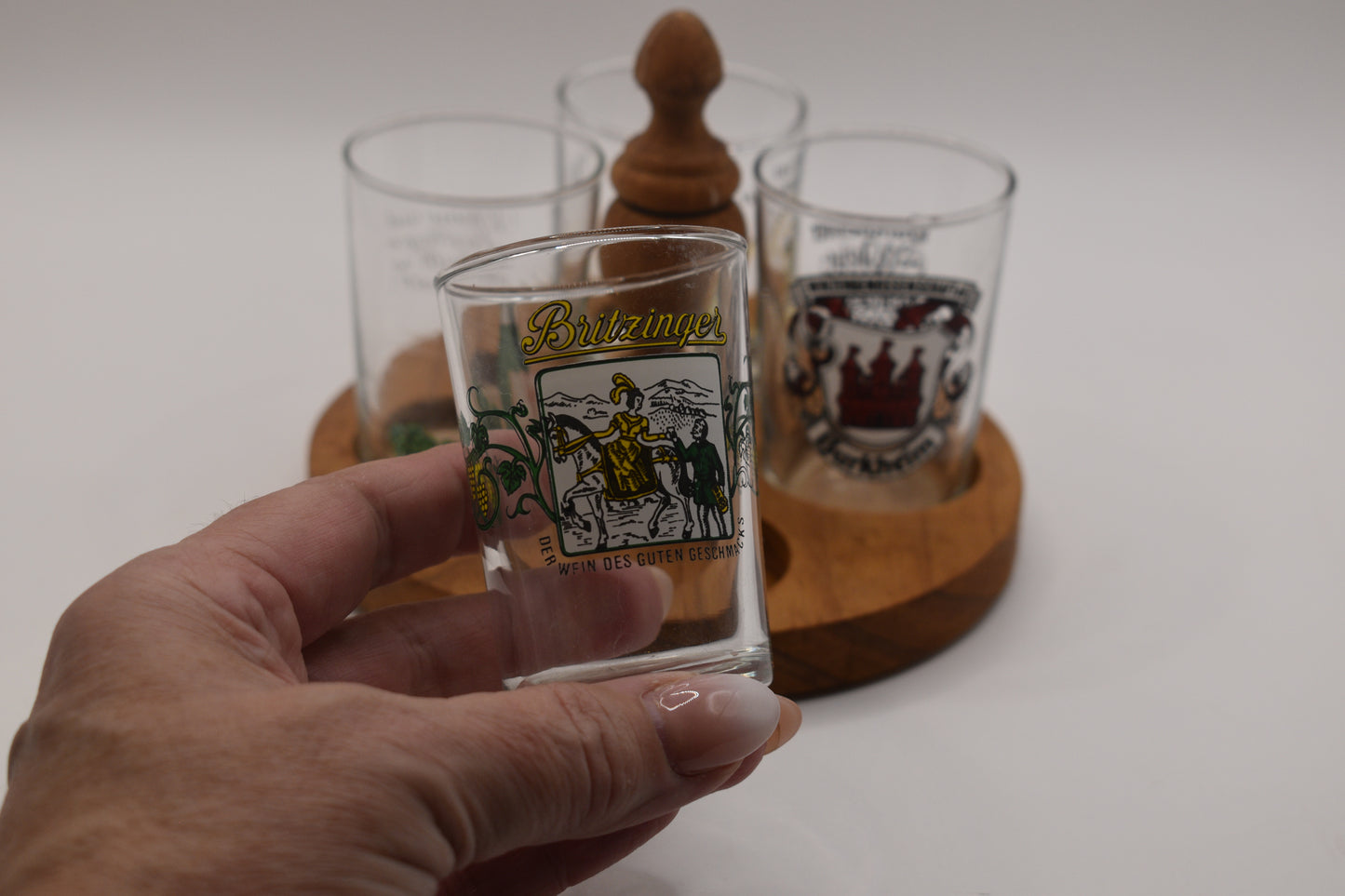 Vintage set of German Wine Tasting Glasses on wooden tray.