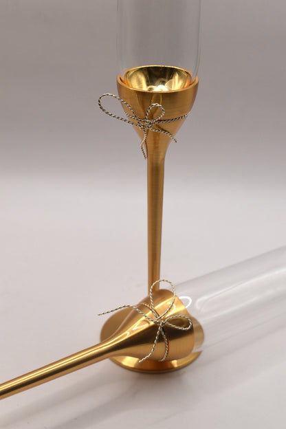 Wedgwood Vera Wang "Love Knots" gold toasting flute pair.