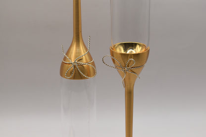 Wedgwood Vera Wang "Love Knots" gold toasting flute pair.