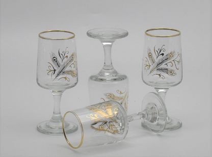 Vintage Liqueur Glasses with gold trim and gold peacock feather design. Set of 4