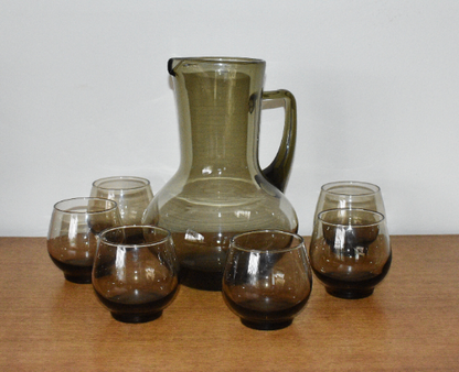 Smokey Green cocktail pitcher with six roly poly glasses.