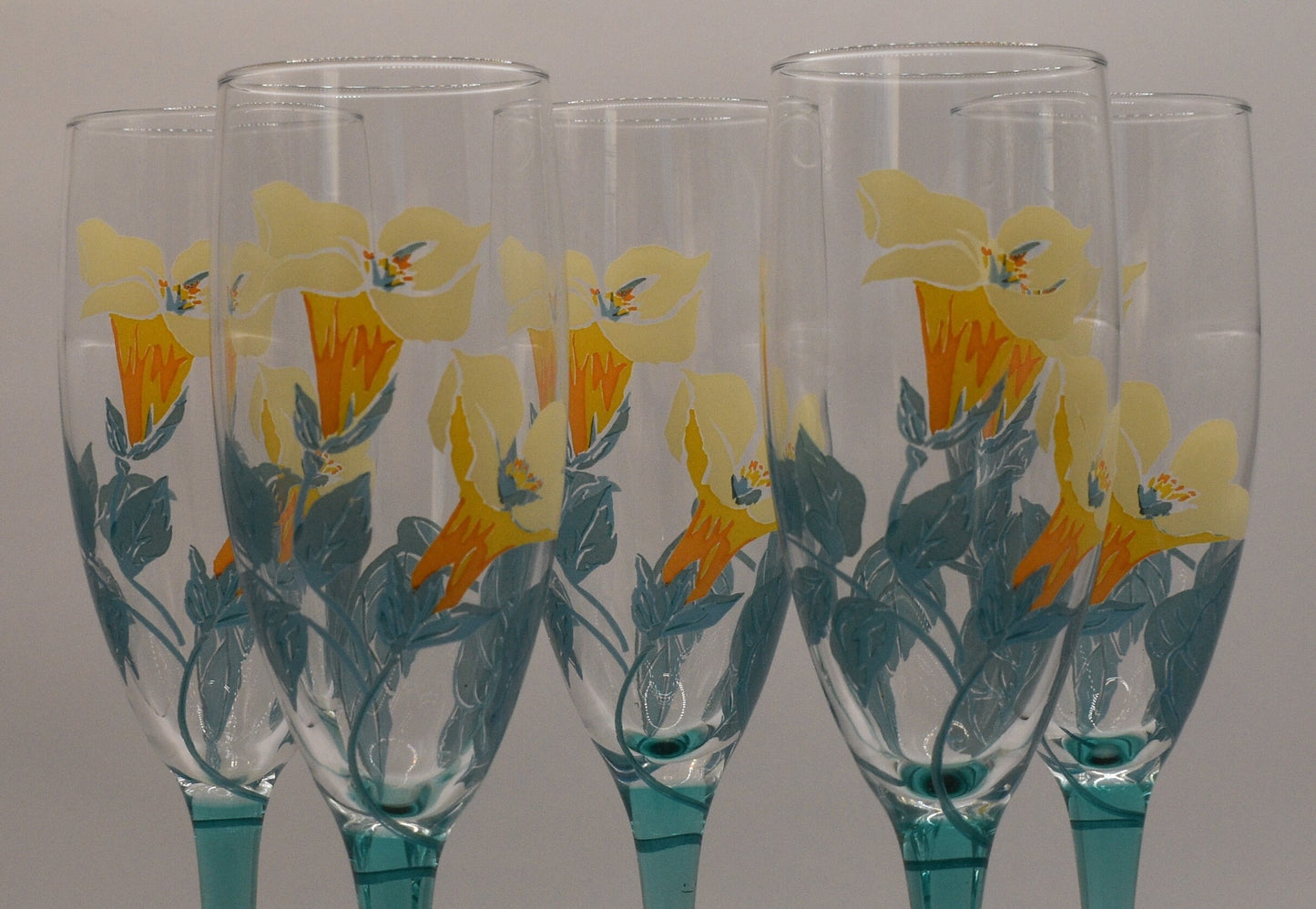 Hand painted France Luminarc Aqua Blue/Teal stemmed Champagne Flutes. Flower motif. Set of 5