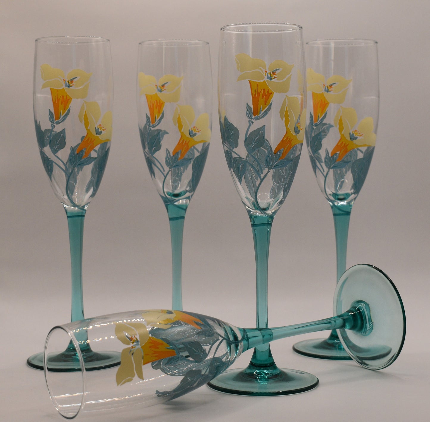 Hand painted France Luminarc Aqua Blue/Teal stemmed Champagne Flutes. Flower motif. Set of 5