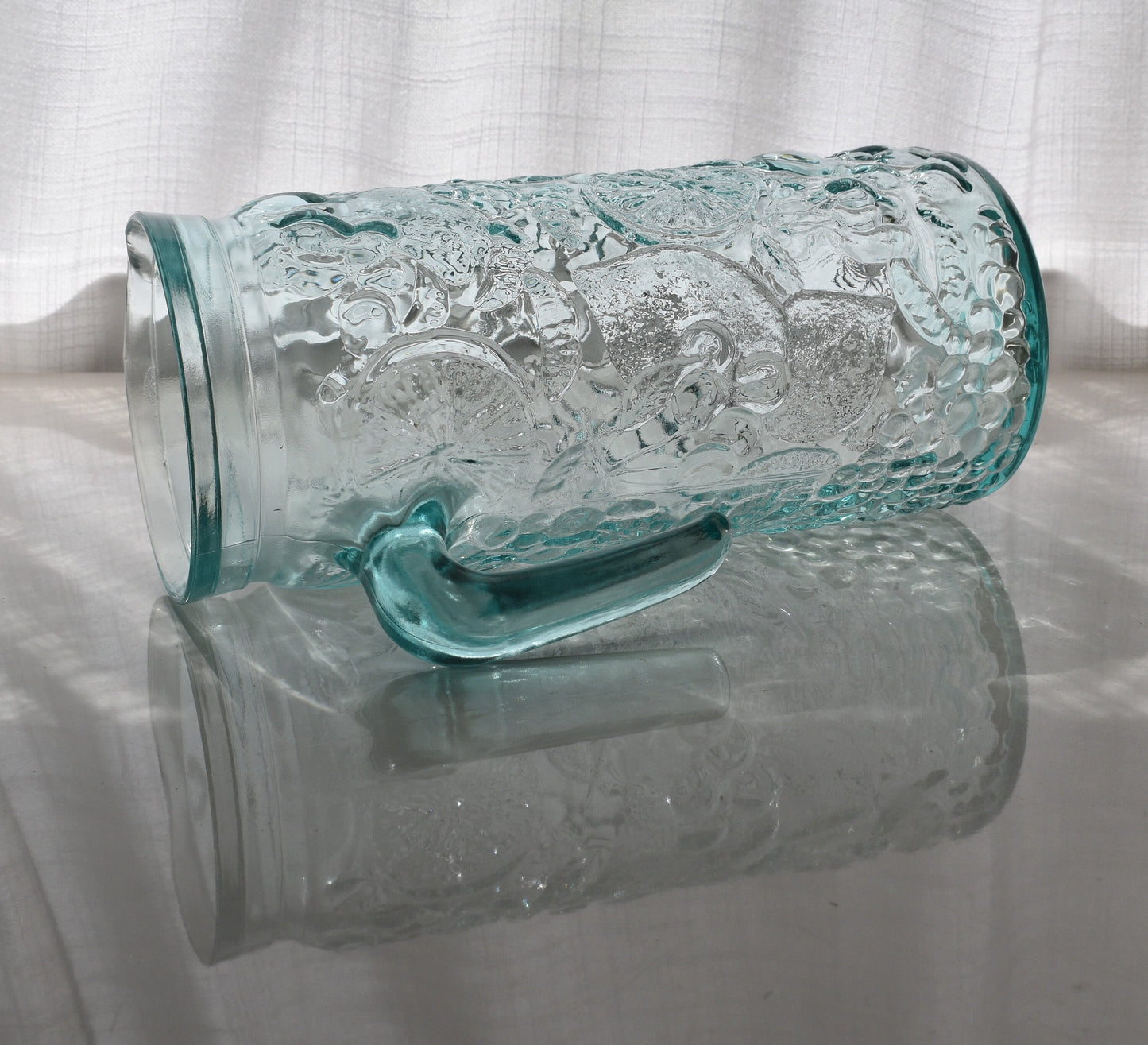 Vetreria Etrusca Green Embossed Fruit Pattern Pitcher.