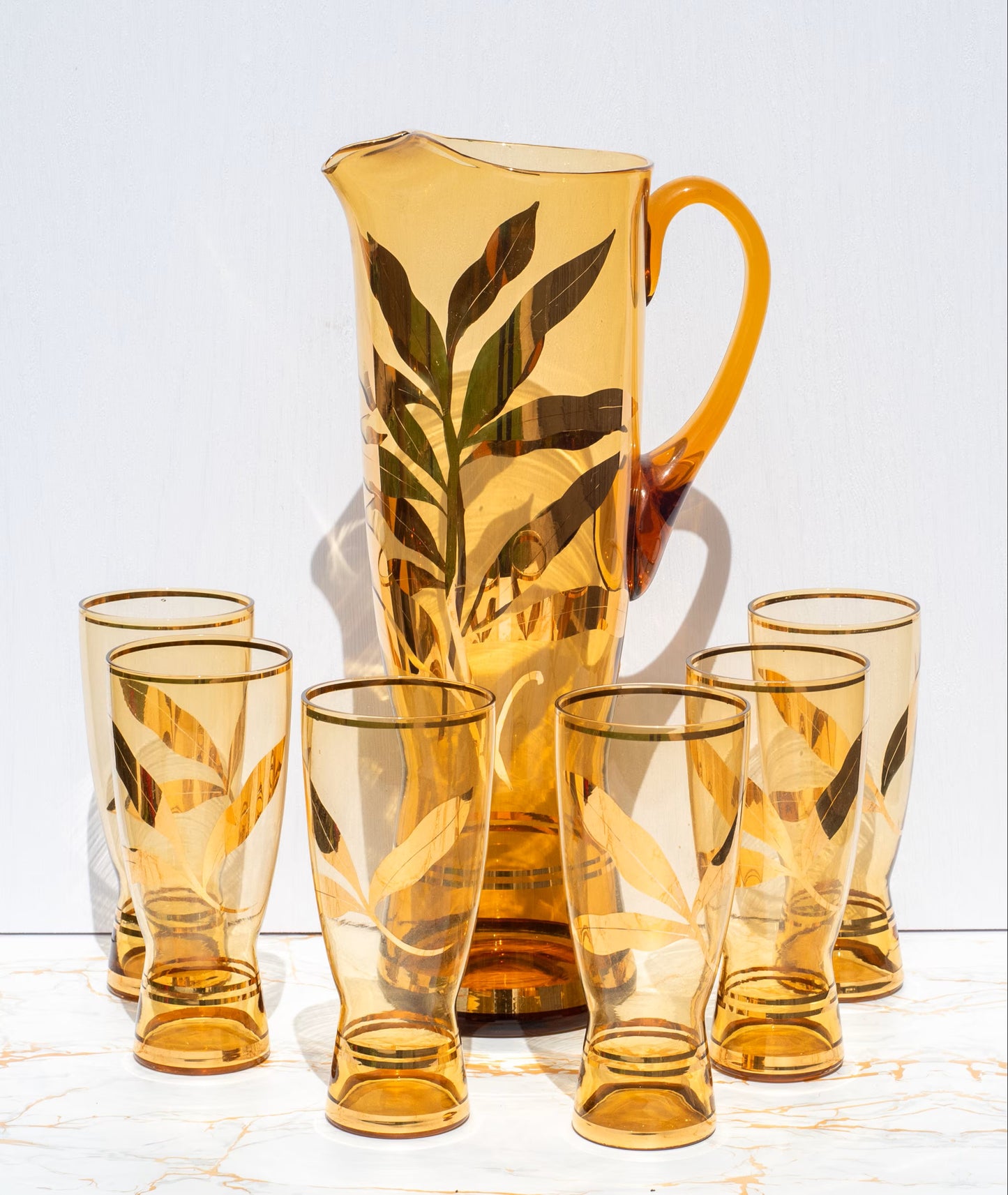 Vintage Amber and Gold leaf motif Water Set. Pitcher with 6 tall tumbler glasses.