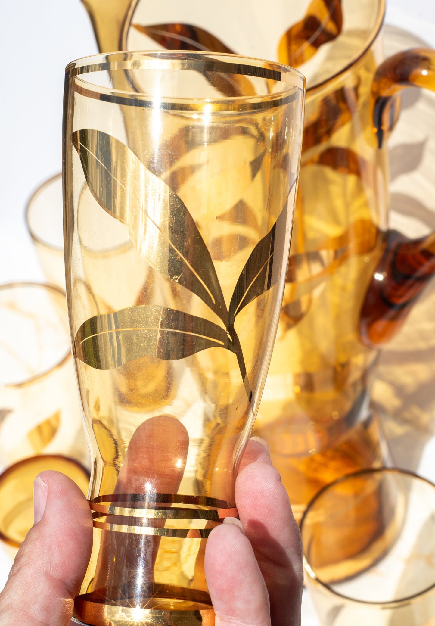 Vintage Amber and Gold leaf motif Water Set. Pitcher with 6 tall tumbler glasses.