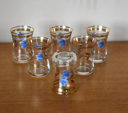 Vintage stemless shot glasses with hand painted blue flower design with leaves and gold trimmings. Sherry Glasses. Port Glasses. Set of 6