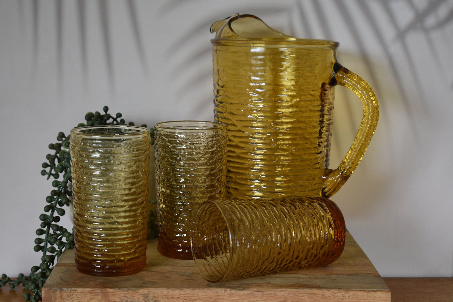 Vintage Anchor Hocking Soreno Gold Amber Glass Pitcher and 3 glass tumblers.